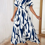 Printed waist cinching dress