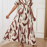 Printed waist cinching dress