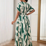 Printed waist cinching dress