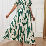 Printed waist cinching dress