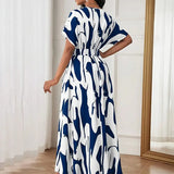 Printed waist cinching dress