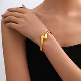 Water Drop Streamline Statement Open Bangle