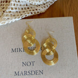 Gold Multi - Layered Circular Hollow Statement Drop Earrings