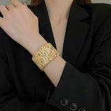 Twisted Cuff Bracelet (Gold & Silver)