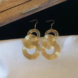 Gold Multi - Layered Circular Hollow Statement Drop Earrings
