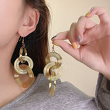 Gold Multi - Layered Circular Hollow Statement Drop Earrings