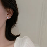 Four - Prong Zircon Stud Earrings