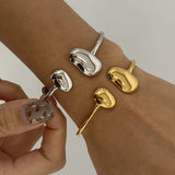 Irregular Water - Drop Open Stainless Steel Bangle