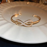Gold-Plated Zircon Titanium Steel Infinity-Design Women’s Bangle