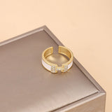 Gold-Plated Korean H Logo White Enamel & Zircon Open Ring