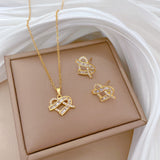 Gold-Plated Twisted Heart Baguette Zircon Jewelry Set (Necklace & Earrings)